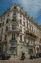 Scooters, building and blue sky on street of Montmartre at Paris.